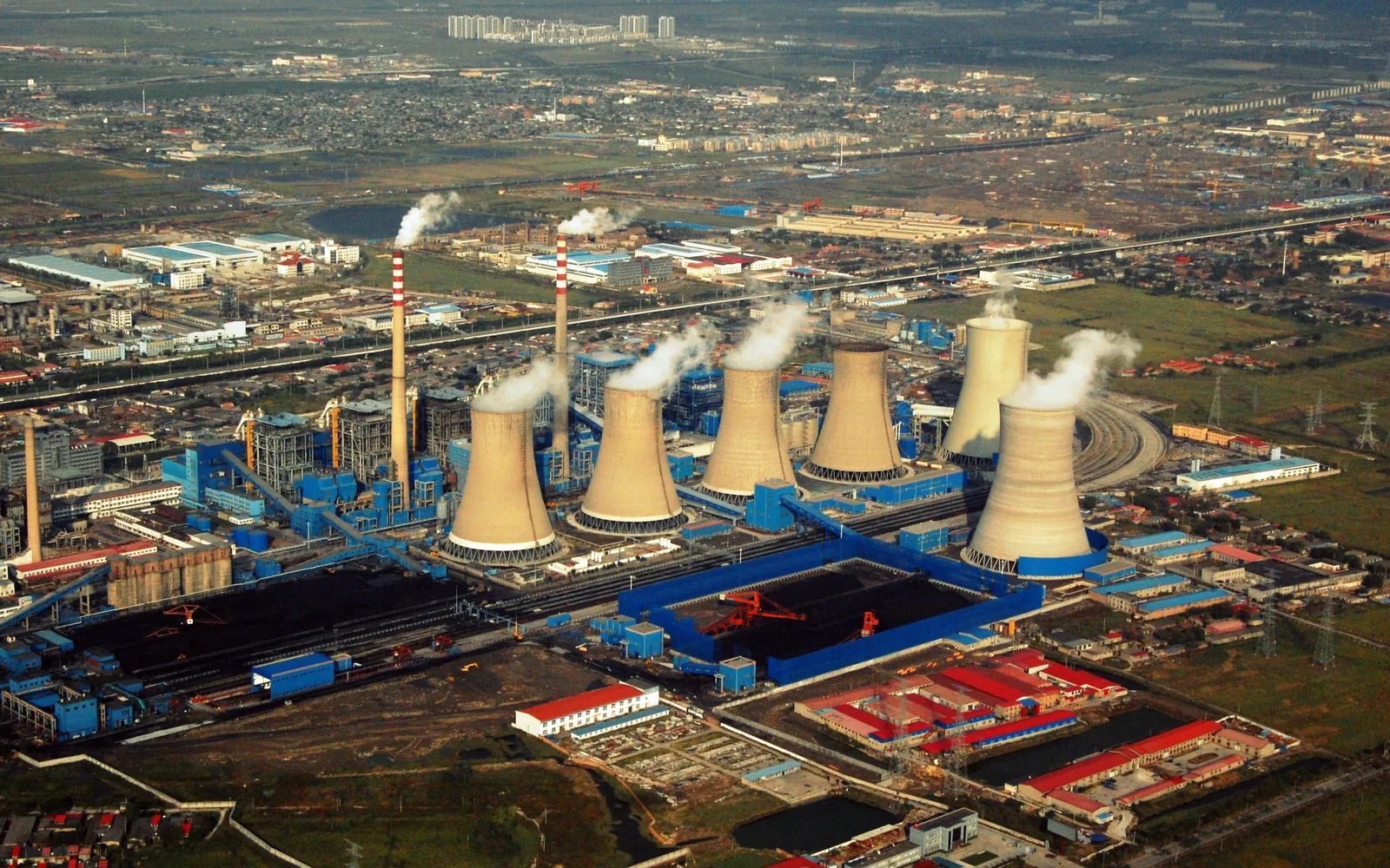 Aerial view of a coal-fired power plant with cooling towers in Tianjin, China